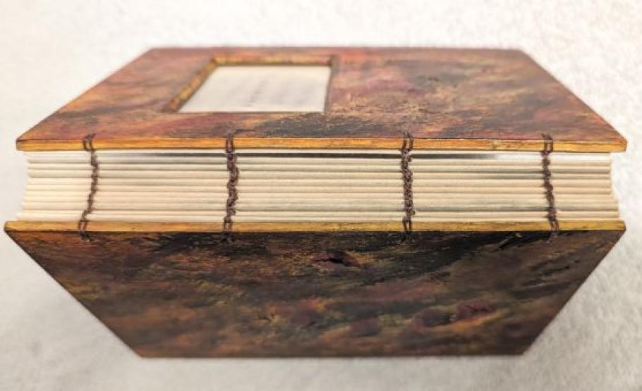 The spine of a hand-bound book. 