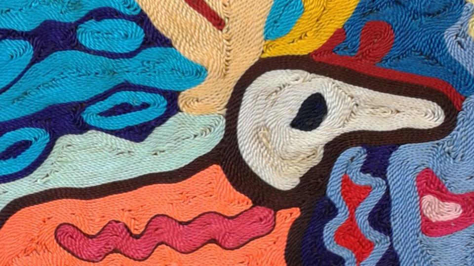 Huichol Yarn Painting in bright colours