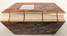 The spine of a hand-bound book. 